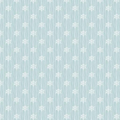 Twenty sheets of translucent frosted vellum, one lifted over a printed floral sheet to show how the pattern softens and pales underneath